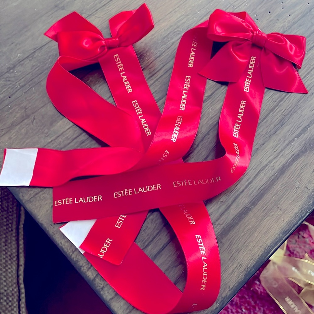 Vintage Estée Lauder red bows